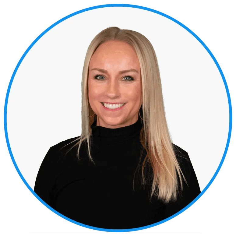 Professional headshot of a smiling blonde woman in a black turtleneck, framed by a circular blue and white border, ideal for business profiles.