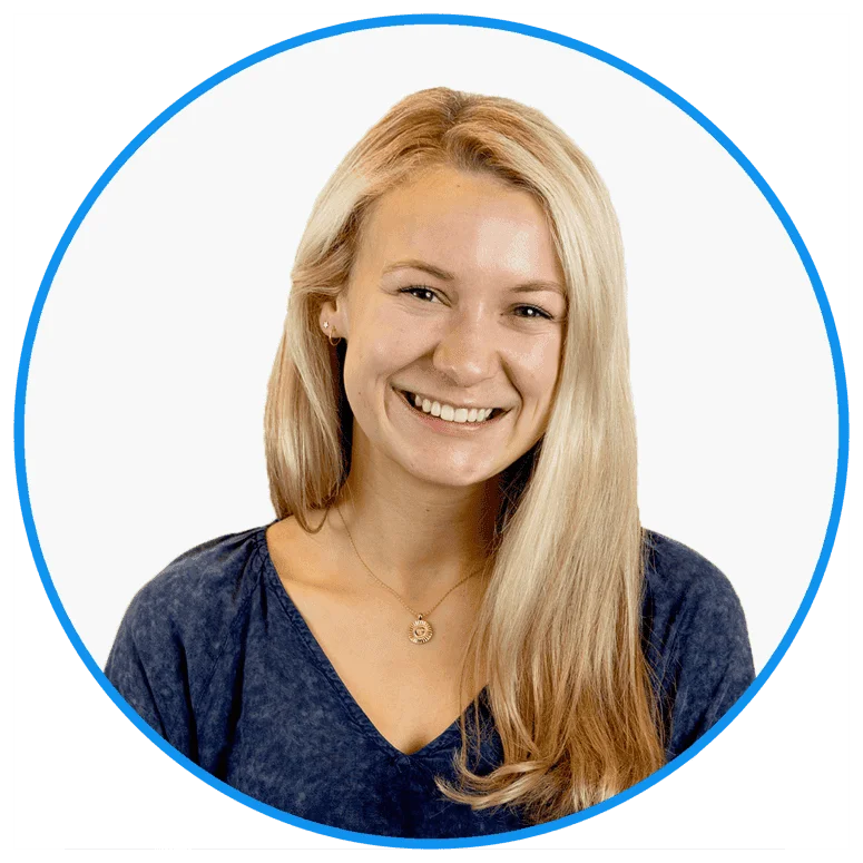 Smiling young woman with blonde hair, blue top, and a necklace, circled in blue against a white background, portrait for professional use.