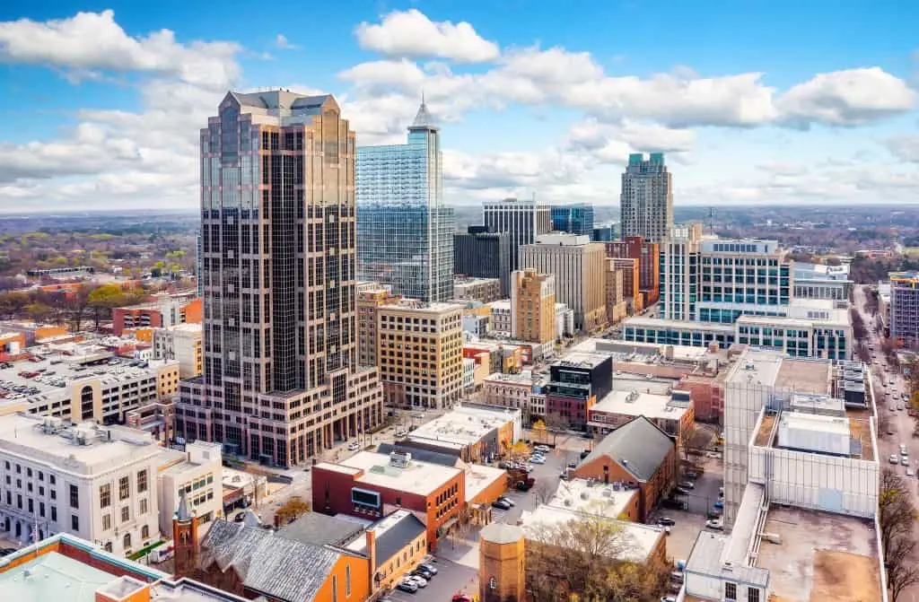 Aerial of Raleigh, North Carolina skyline on a sunny day.